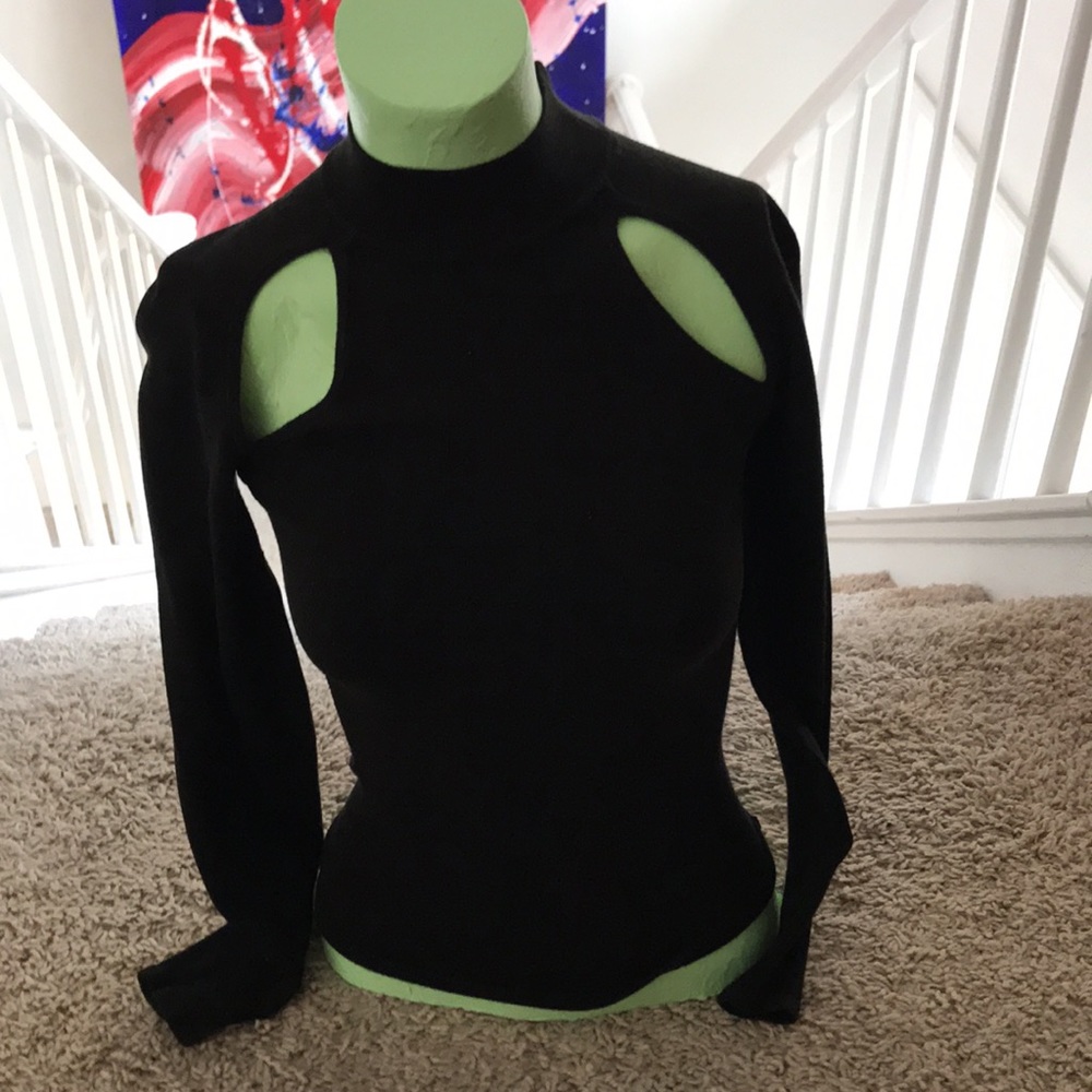 Small black top with holes in the shoulder area